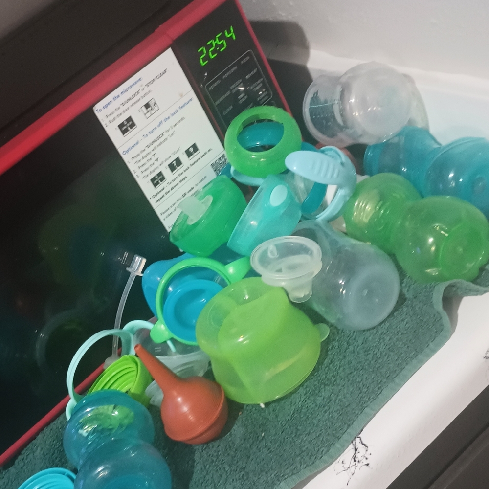 Assorted Baby Bottle Accessories in Green and Teal Never Used..